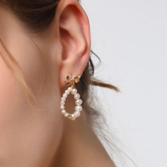 Boucles d'oreilles créoles élégantes en perles pour dame